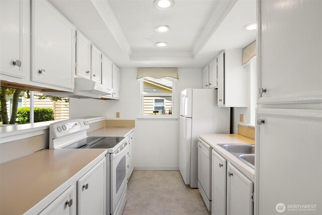 24831 110th Pl SE Unit 51D, Kent, WA 98030 - kitchen featuring white appliances, a tray ceiling, healthy amount of natural light, white cabinets, and recessed lighting