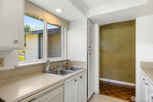 24831 110th Pl SE Unit 51D, Kent, WA 98030 - kitchen with baseboards, a sink, wallpapered walls, white cabinets, and dishwasher