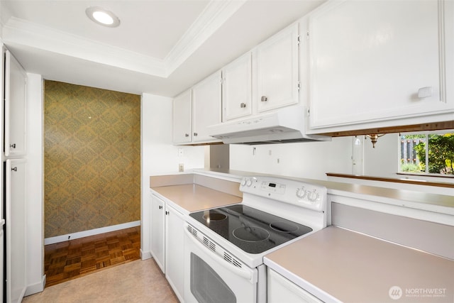 24831 110th Pl SE Unit 51D, Kent, WA 98030 - kitchen featuring white range with electric cooktop, under cabinet range hood, white cabinetry, light countertops, and ornamental molding