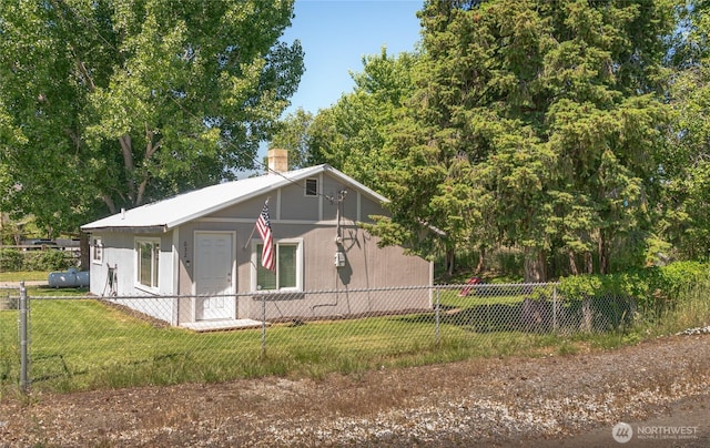 632 Dayton St, Omak, WA 98841 - view of front of house with a chimney