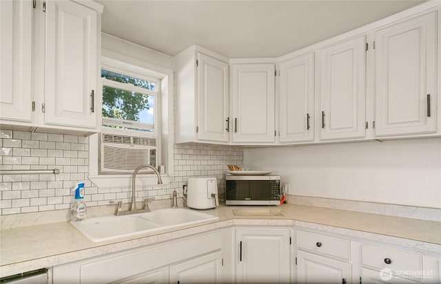 632 Dayton St, Omak, WA 98841 - kitchen featuring stainless steel microwave, a sink, and white cabinets