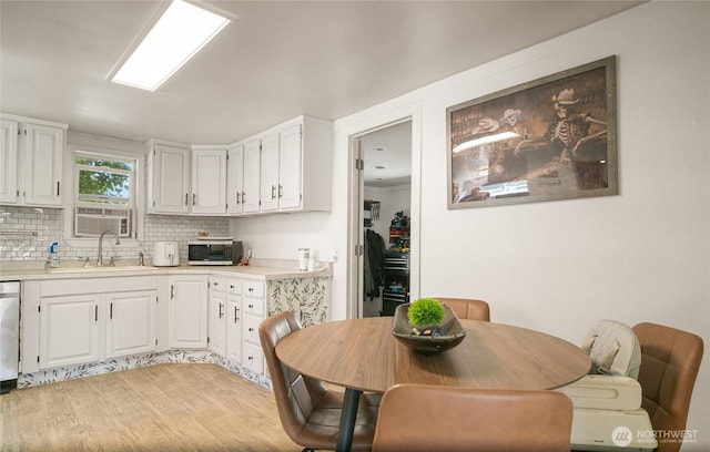 632 Dayton St, Omak, WA 98841 - kitchen featuring a sink, white cabinetry, and light countertops
