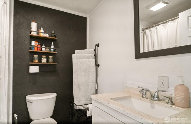 632 Dayton St, Omak, WA 98841 - bathroom featuring vanity and toilet