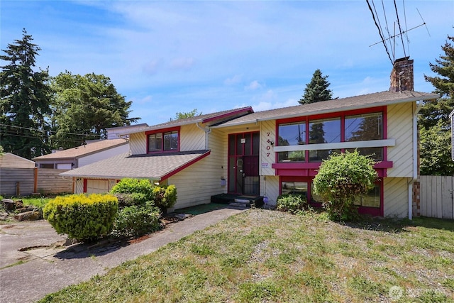 7407 25th Ave NE, Seattle, WA 98115 - bi-level home featuring a chimney and an attached garage