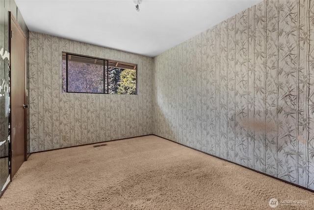7407 25th Ave NE, Seattle, WA 98115 - empty room with carpet and wallpapered walls