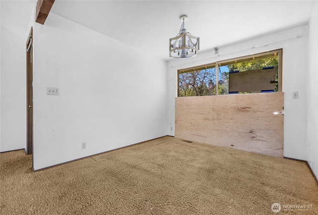 7407 25th Ave NE, Seattle, WA 98115 - unfurnished dining area with carpet flooring and a chandelier