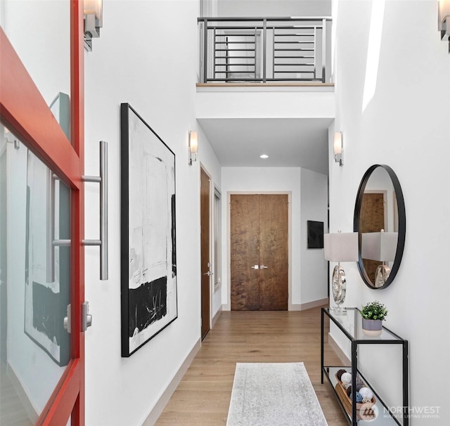 2222 E Mcgraw St, Seattle, WA 98112 - hallway with a high ceiling, wood finished floors, baseboards, and recessed lighting