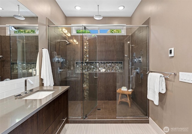 2222 E Mcgraw St, Seattle, WA 98112 - full bath featuring vanity, a stall shower, and tile patterned flooring