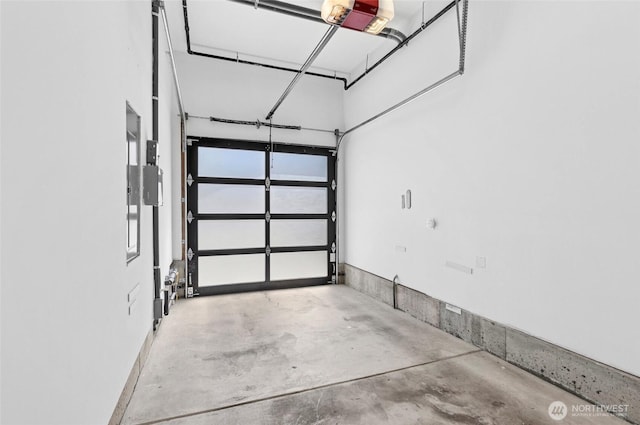 2222 E Mcgraw St, Seattle, WA 98112 - garage featuring a garage door opener