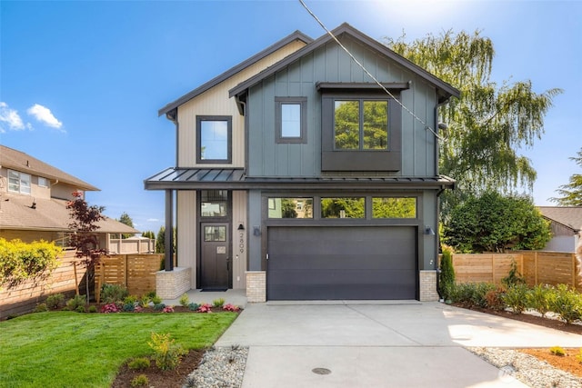 2809 12th Ave W, Seattle, WA 98118 - view of front of property featuring a standing seam roof, a garage, driveway, and brick siding