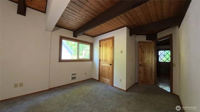 321 N Lake Surf Dr, Lilliwaup, WA 98555 - unfurnished bedroom featuring carpet and a wood ceiling with exposed beams