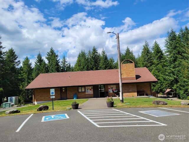 321 N Lake Surf Dr, Lilliwaup, WA 98555 - view of building exterior featuring uncovered parking