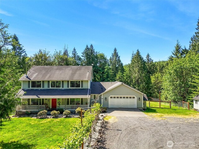 114 Black Bear Ln, Centralia, WA 98531 - view of front of home with covered porch, driveway, and an attached garage