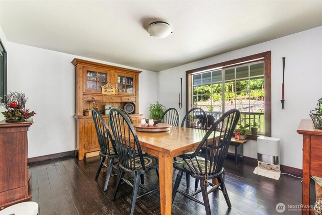 114 Black Bear Ln, Centralia, WA 98531 - dining space with dark wood-type flooring and baseboards