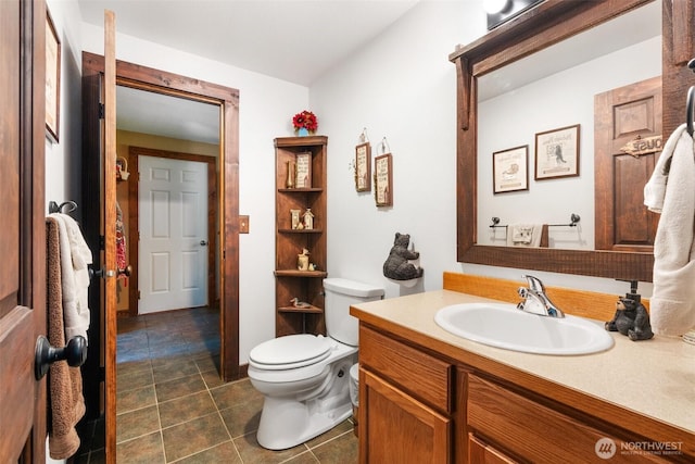114 Black Bear Ln, Centralia, WA 98531 - bathroom with toilet, vanity, and tile patterned flooring