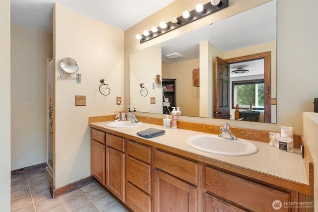 114 Black Bear Ln, Centralia, WA 98531 - full bath featuring double vanity, ensuite bathroom, curtained shower, tile patterned floors, and baseboards