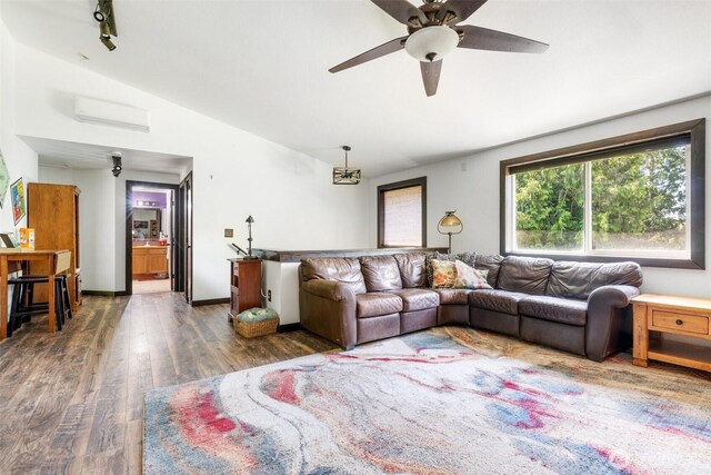 114 Black Bear Ln, Centralia, WA 98531 - living room featuring vaulted ceiling, wood finished floors, and ceiling fan