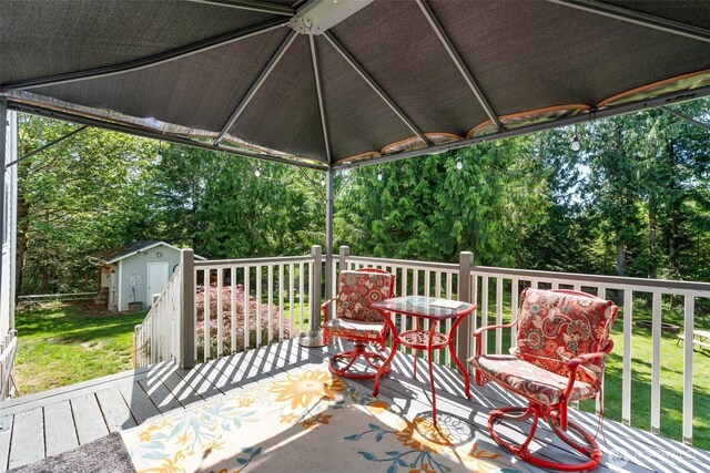114 Black Bear Ln, Centralia, WA 98531 - deck with view of wooded area and a lawn