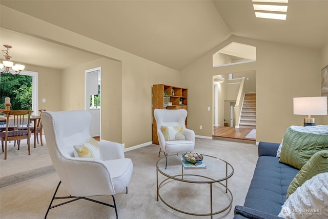 17620 NE 29th St, Redmond, WA 98052 - living area with light carpet, stairs, a chandelier, baseboards, and high vaulted ceiling