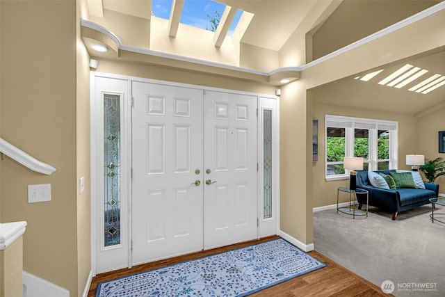 17620 NE 29th St, Redmond, WA 98052 - entrance foyer with lofted ceiling, wood finished floors, and baseboards