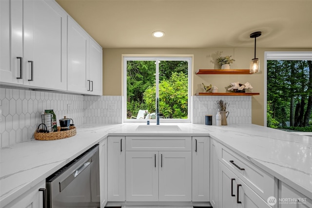 17620 NE 29th St, Redmond, WA 98052 - kitchen with stainless steel dishwasher, white cabinetry, tasteful backsplash, a sink, and open shelves