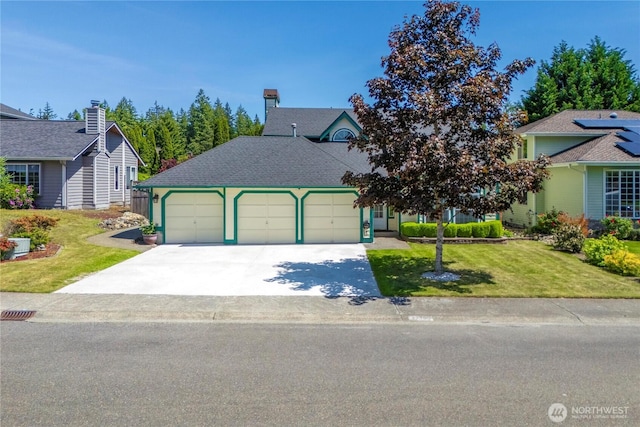 27742 214th Ave SE, Maple Valley, WA 98038 - view of front facade with a garage, a front yard, and concrete driveway