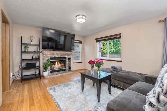27742 214th Ave SE, Maple Valley, WA 98038 - living area with a fireplace and wood finished floors