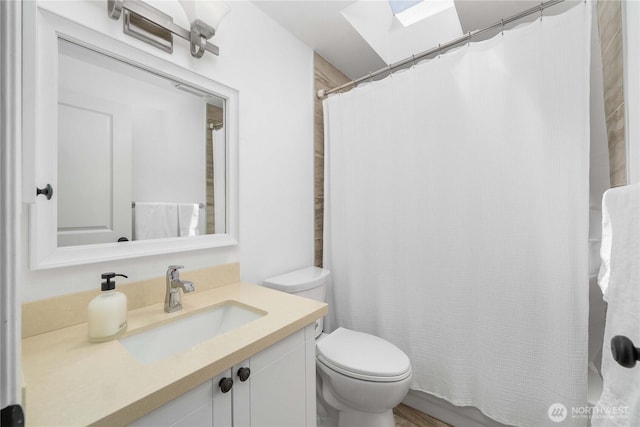 27742 214th Ave SE, Maple Valley, WA 98038 - full bath with a skylight, toilet, vanity, and a shower with curtain