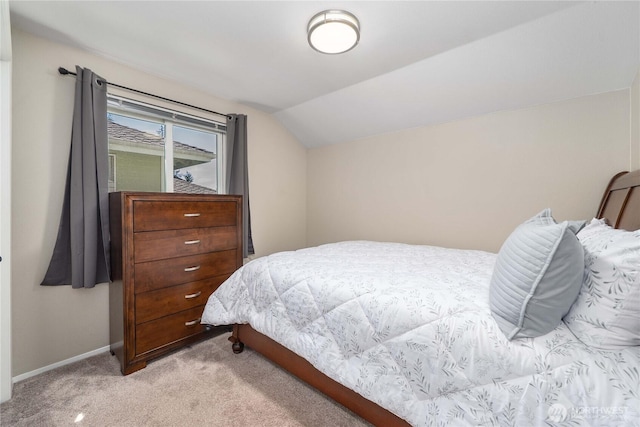 27742 214th Ave SE, Maple Valley, WA 98038 - bedroom with vaulted ceiling, light carpet, and baseboards