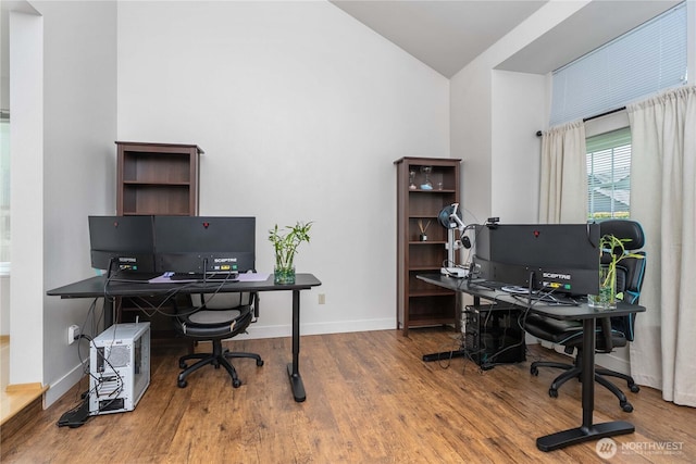 27742 214th Ave SE, Maple Valley, WA 98038 - office area with wood finished floors, vaulted ceiling, and baseboards