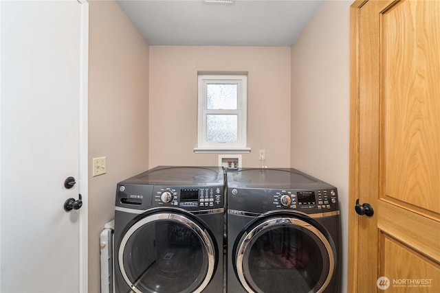 27742 214th Ave SE, Maple Valley, WA 98038 - laundry area featuring washing machine and clothes dryer