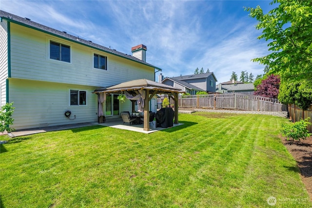 27742 214th Ave SE, Maple Valley, WA 98038 - rear view of house with a gazebo, a chimney, and a patio area