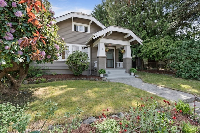 2902 N 22nd, Tacoma, WA 98406 - craftsman-style home with a front yard and covered porch
