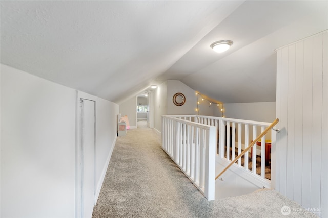 2902 N 22nd, Tacoma, WA 98406 - corridor with an upstairs landing, lofted ceiling, carpet floors, and baseboards
