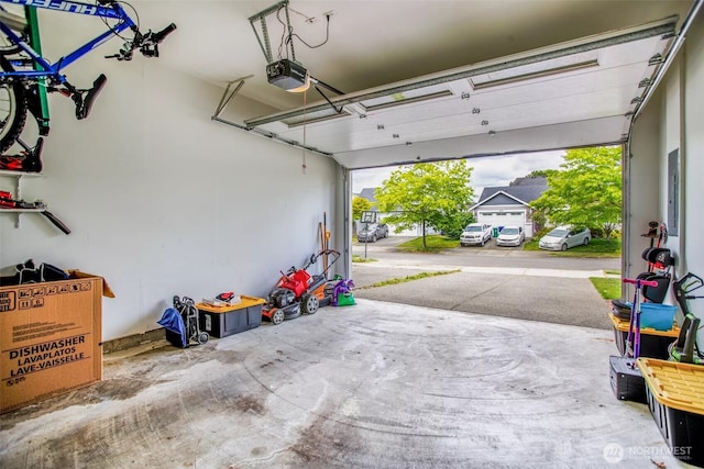 570 Beaver Blvd Unit A, Pacific, WA 98047 - garage with a garage door opener and electric panel