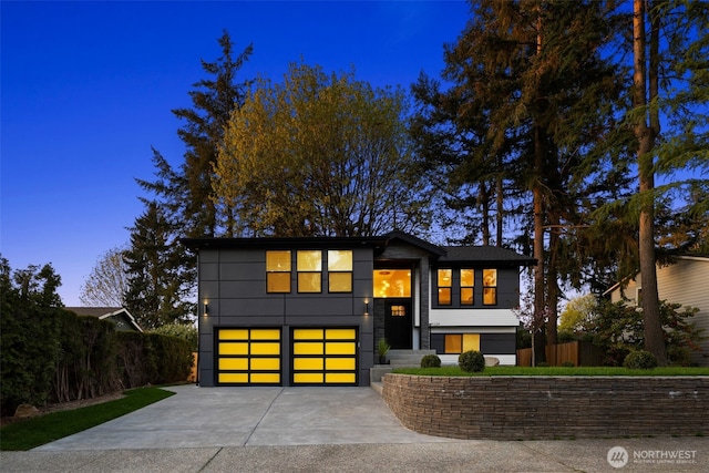 9124 NE 139th St, Kirkland, WA 98034 - contemporary house featuring an attached garage and concrete driveway