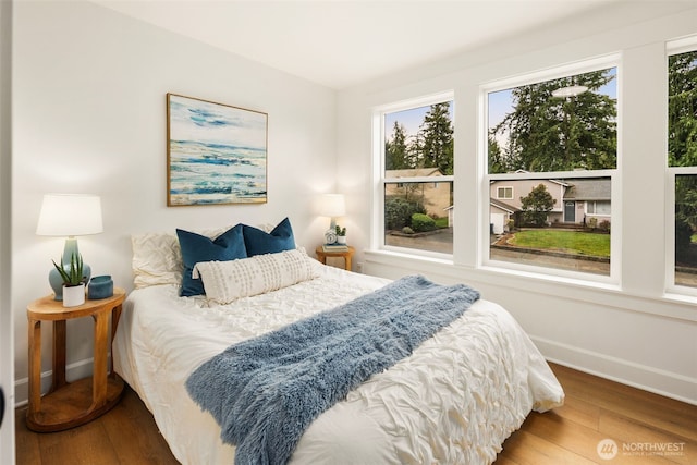 9124 NE 139th St, Kirkland, WA 98034 - bedroom featuring wood finished floors and baseboards