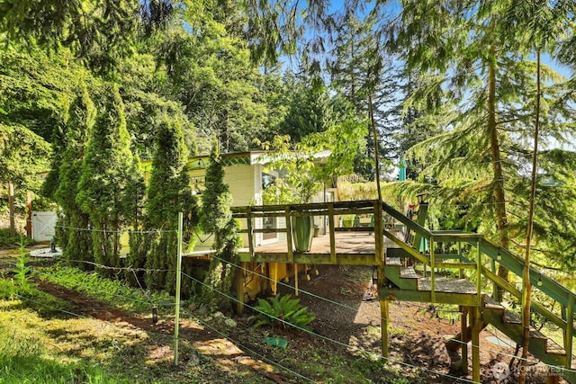 1713 Pebble Beach Trl, Bellingham, WA 98226 - back of property with a wooden deck and stairway