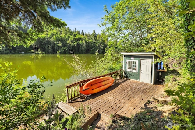 1713 Pebble Beach Trl, Bellingham, WA 98226 - wooden terrace with a water view and an outbuilding