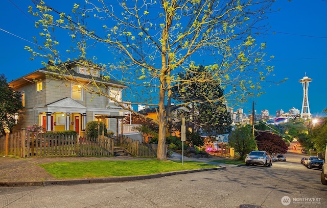 920 4th Ave N, Seattle, WA 98109 - view of front of home with a fenced front yard and covered porch