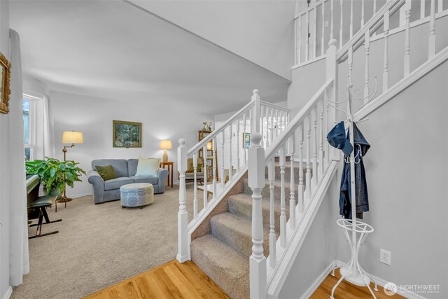 25161 13th Ave S, Des Moines, WA 98198 - stairs featuring wood finished floors and baseboards