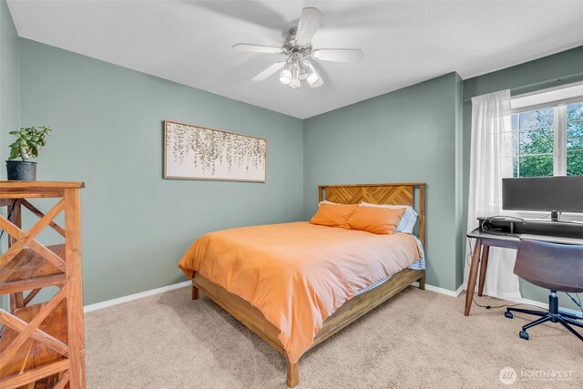 25161 13th Ave S, Des Moines, WA 98198 - carpeted bedroom featuring baseboards and ceiling fan