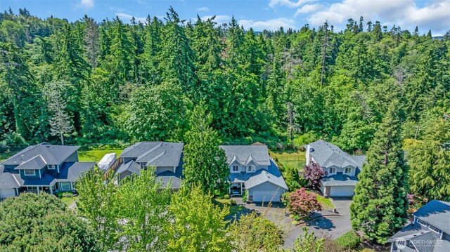 25161 13th Ave S, Des Moines, WA 98198 - aerial view of residential area with a heavily wooded area