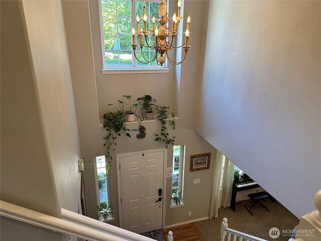 25161 13th Ave S, Des Moines, WA 98198 - entryway featuring a chandelier and healthy amount of natural light
