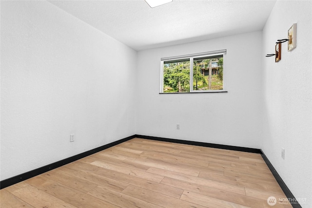 1668 Sapphire Trl, Bellingham, WA 98226 - unfurnished room with light wood-style floors and baseboards