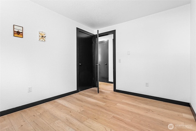 1668 Sapphire Trl, Bellingham, WA 98226 - unfurnished room featuring light wood-style floors and baseboards