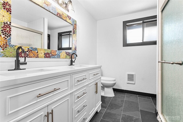1668 Sapphire Trl, Bellingham, WA 98226 - full bath with heating unit, a shower stall, double vanity, toilet, and baseboards
