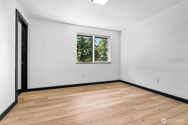 1668 Sapphire Trl, Bellingham, WA 98226 - spare room featuring light wood finished floors and baseboards