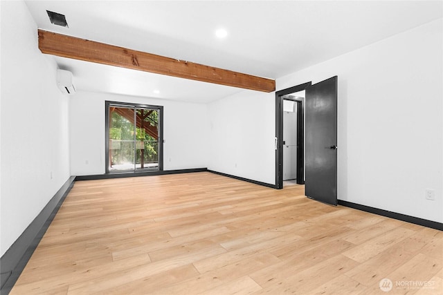 1668 Sapphire Trl, Bellingham, WA 98226 - unfurnished room featuring an AC wall unit, beamed ceiling, light wood-style flooring, recessed lighting, and baseboards