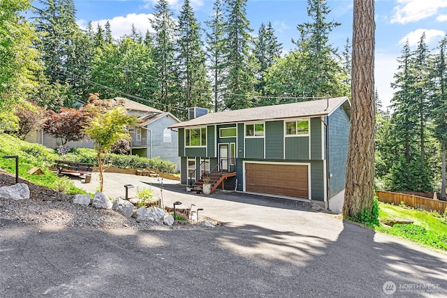 1668 Sapphire Trl, Bellingham, WA 98226 - raised ranch with asphalt driveway and a garage